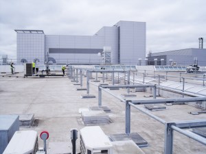 Structural steel extension including pipe-racks, cladding and ladders