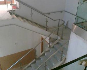 Roof canopy, and internal stainless steel and glass balustrade.